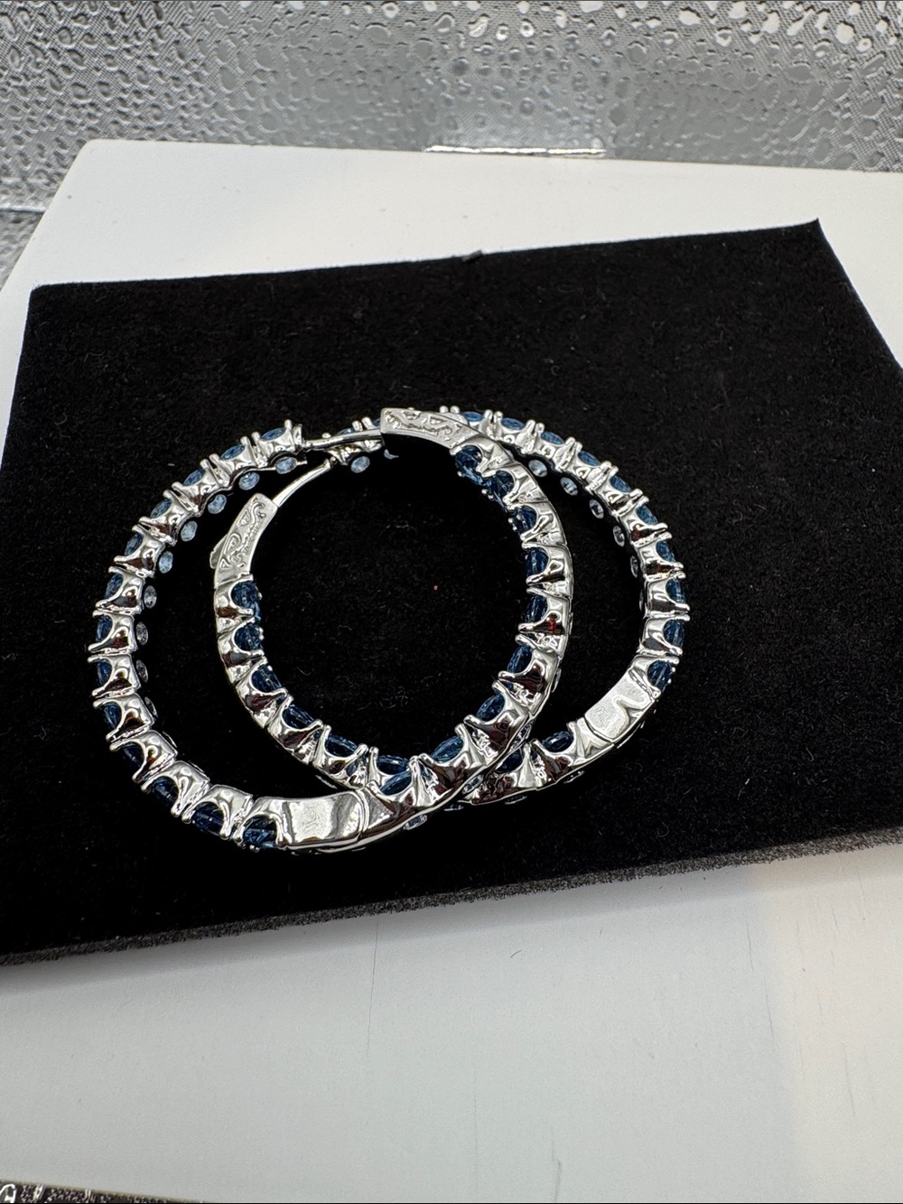 Silver-Tone Hoop Earrings with Dark Blue Stones